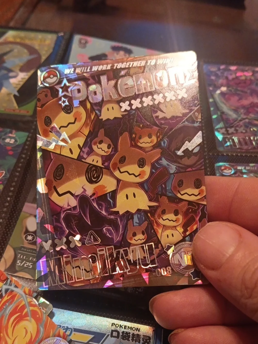 Pokemon Mimikyu Holographic Card – Purple, Yellow, Black